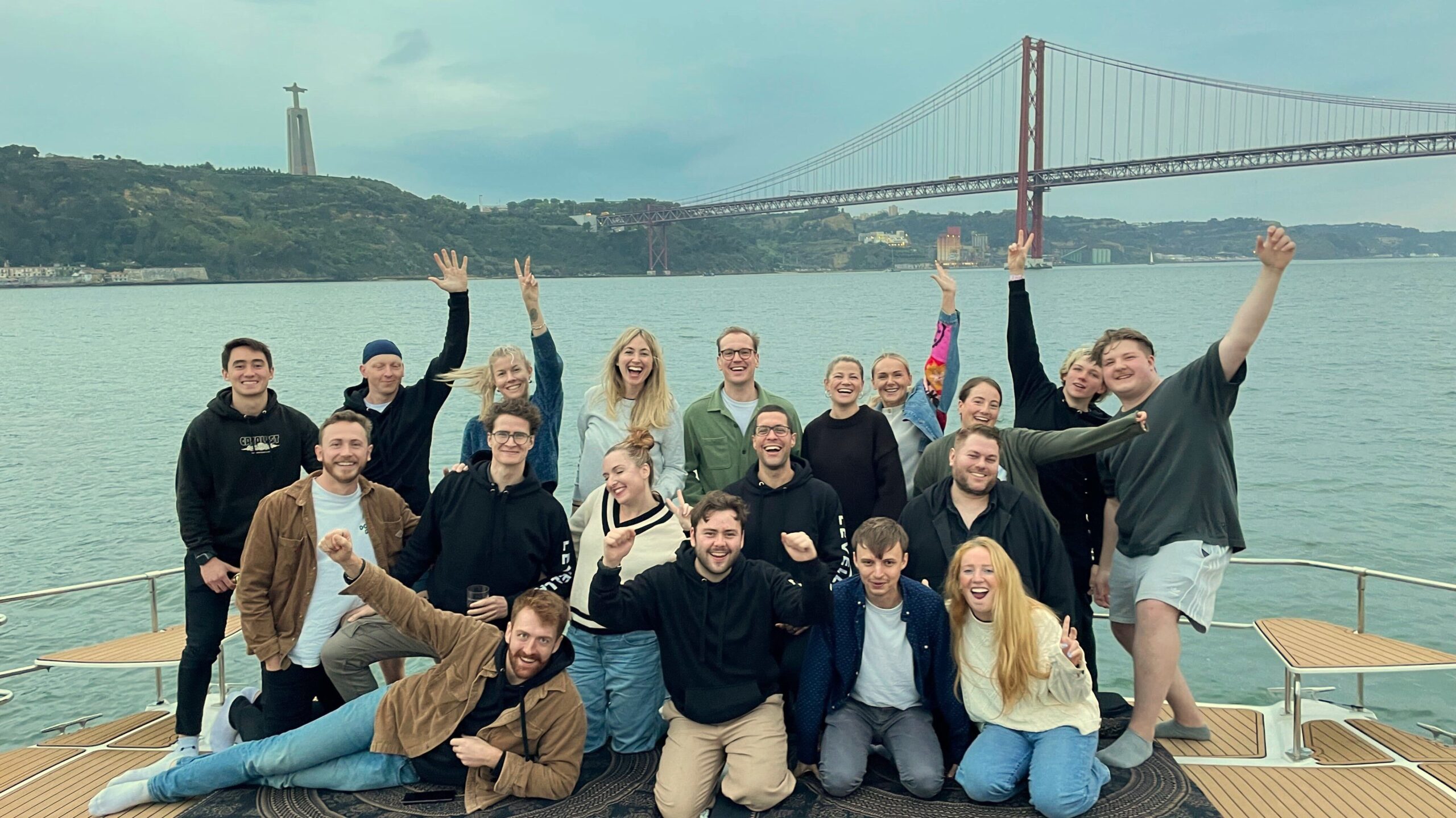 The Levellr staff celebrating on a boat in Lisbon